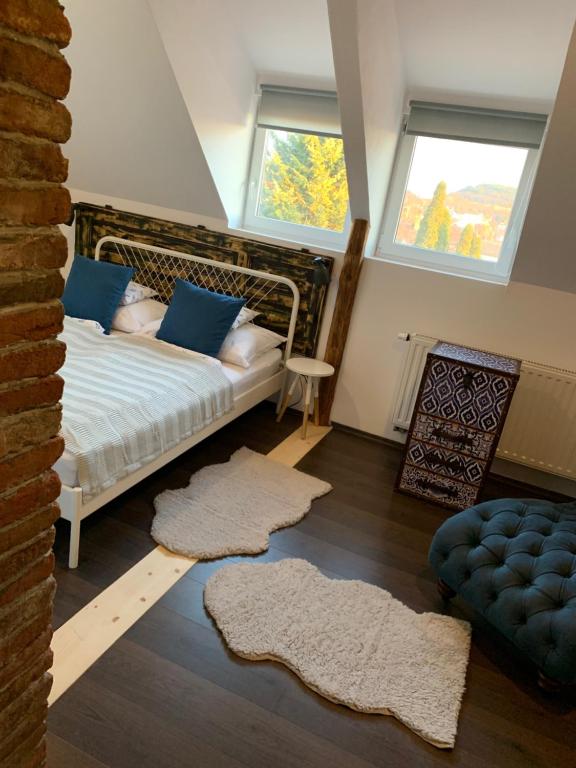 Postel nebo postele na pokoji v ubytování Viktória Inn Tihany