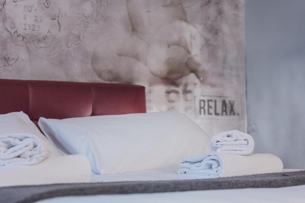 Postel nebo postele na pokoji v ubytování Hotel Cannaregio 2357
