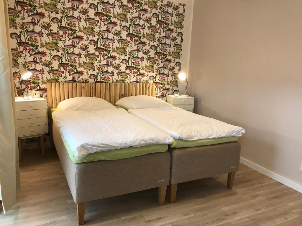 Postel nebo postele na pokoji v ubytování SEASIDE APT. - BEACHHOUSE SOUL