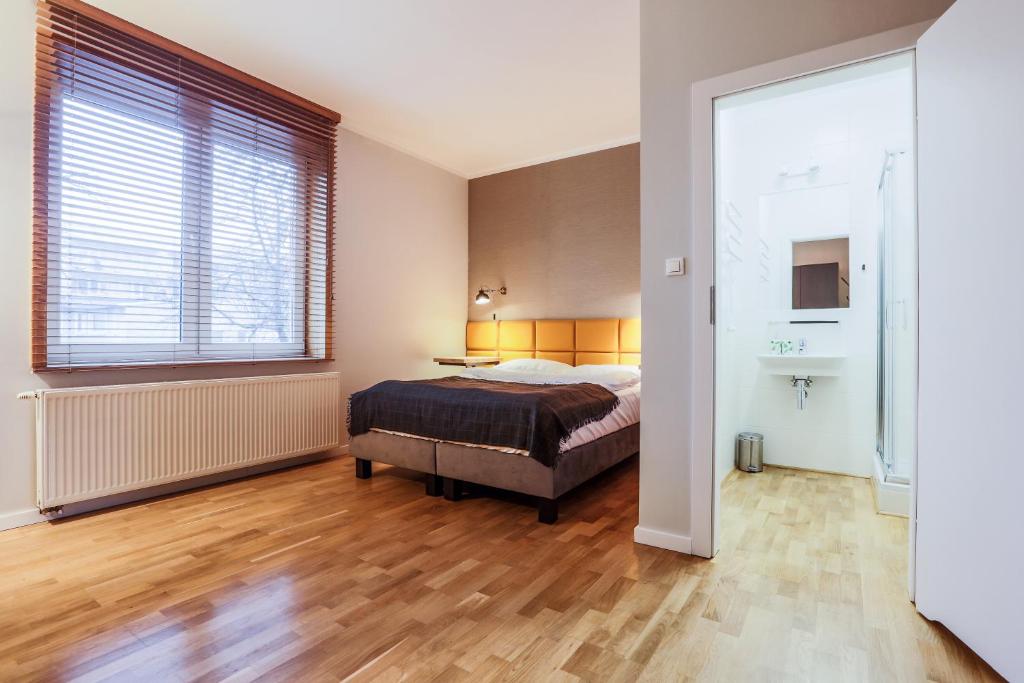 Posteľ alebo postele v izbe v ubytovaní B&B Kraszewskiego3A