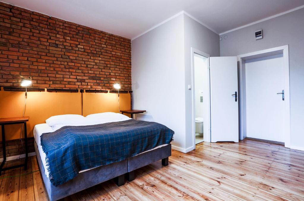 Posteľ alebo postele v izbe v ubytovaní B&B Kraszewskiego3A