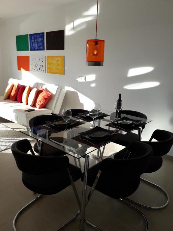 A seating area at Oriuelha Costa Terrazas de Campoamor