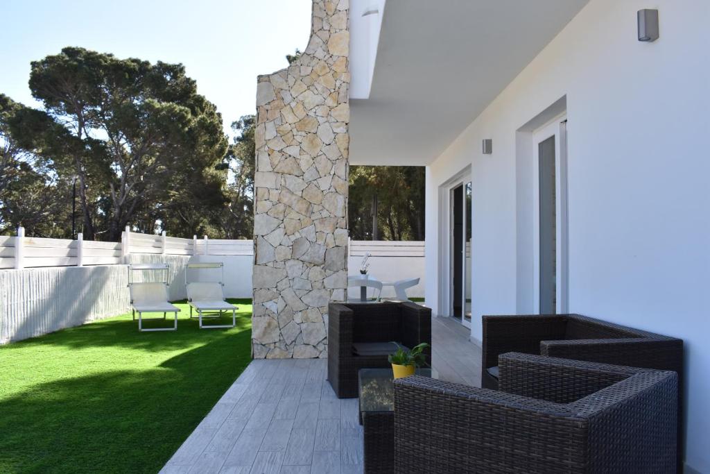Case Vacanze Bianco Mare a Porto Pino - Lussuose Ville