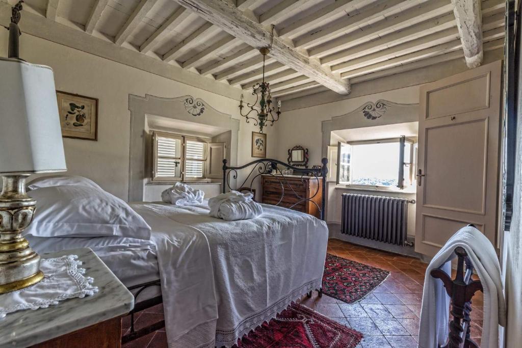 Postel nebo postele na pokoji v ubytování Villa Colletto