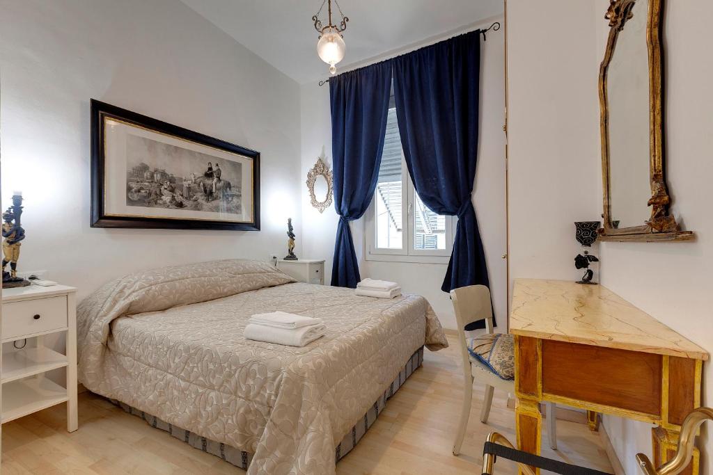 Katil atau katil-katil dalam bilik di Faenza Apartment