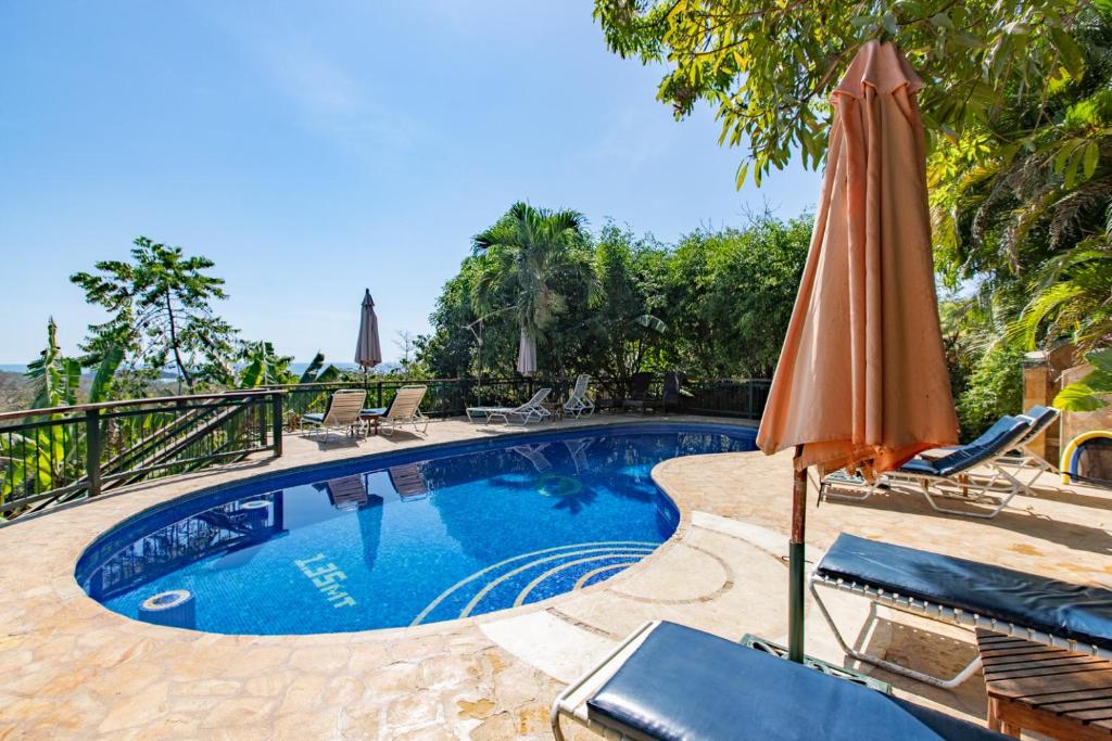 Bazén v ubytování Villa Mango B&B nebo v jeho okolí