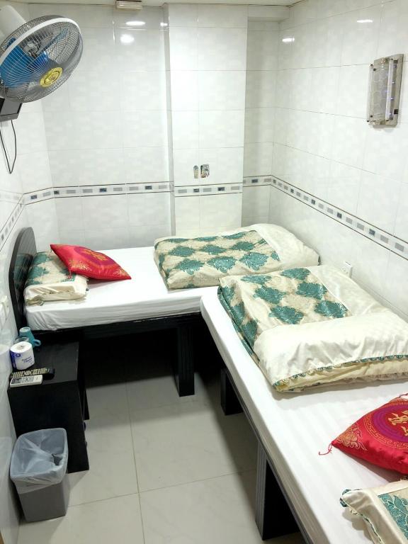 Rúm í herbergi á Philippine Hostel