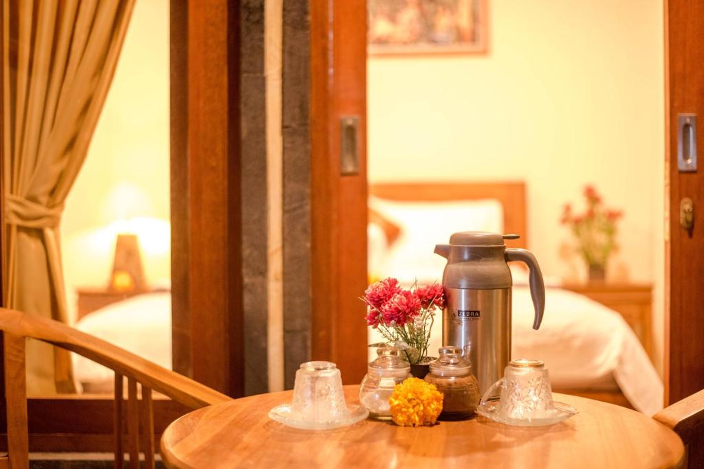 Postel nebo postele na pokoji v ubytování Kamar Suci House