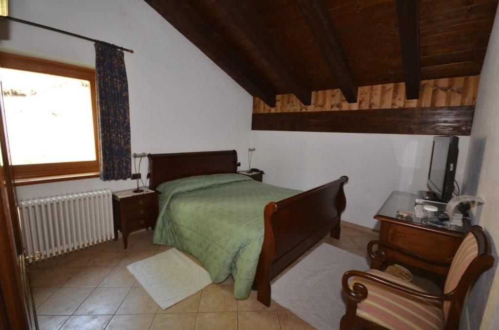 Postel nebo postele na pokoji v ubytování Les Combes