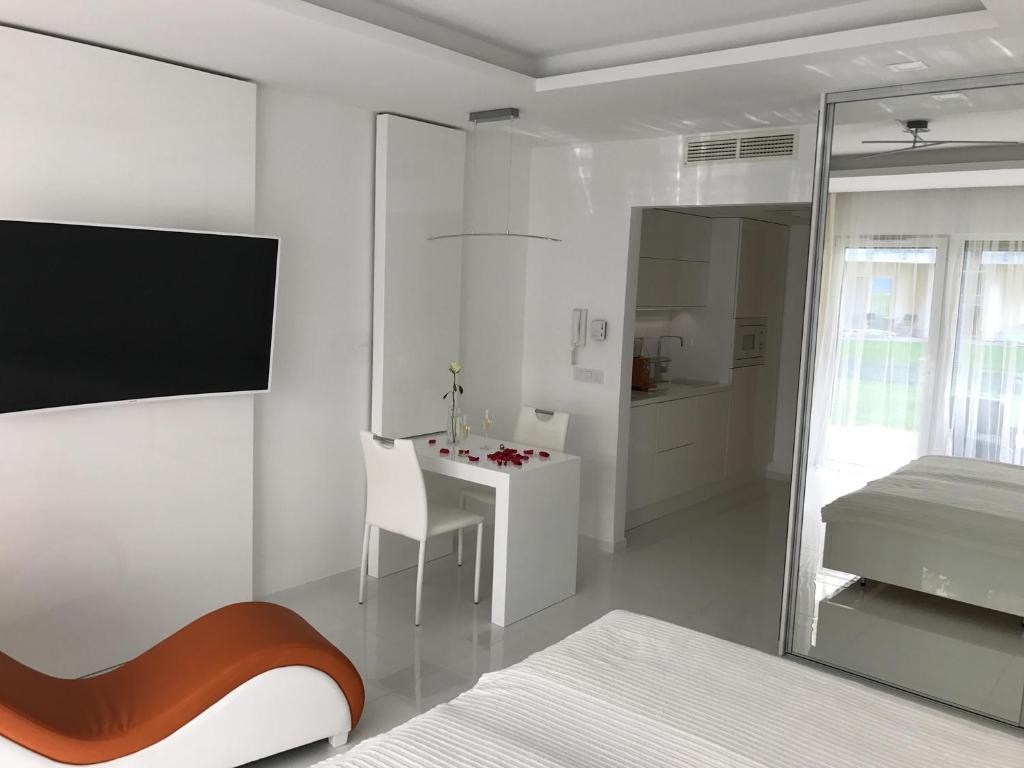 Postel nebo postele na pokoji v ubytování Wellness Apartments in Velence