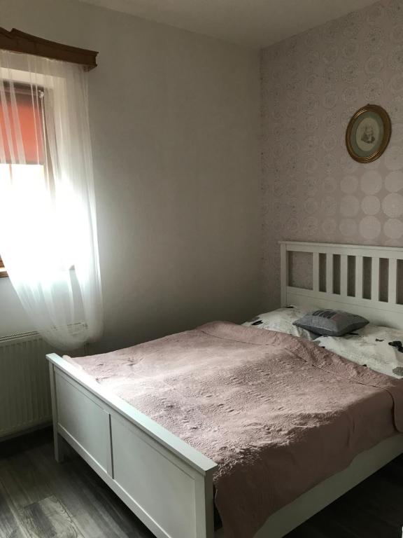 Postel nebo postele na pokoji v ubytování Penzion Hrádecký Dvůr