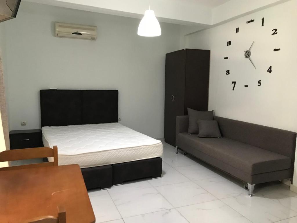 Posteľ alebo postele v izbe v ubytovaní Metamorfosis Apartments