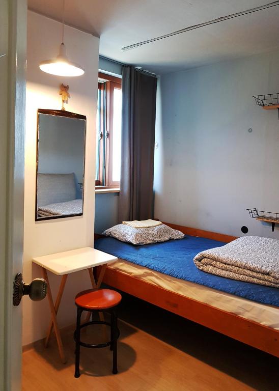 Postel nebo postele na pokoji v ubytování Aark House