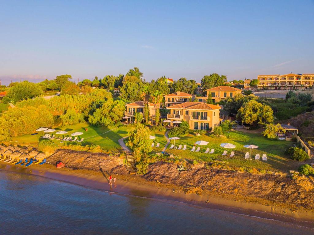 an aerial view of a house on the beach at Kounopetra Beach Luxury Villas in Kounopetra