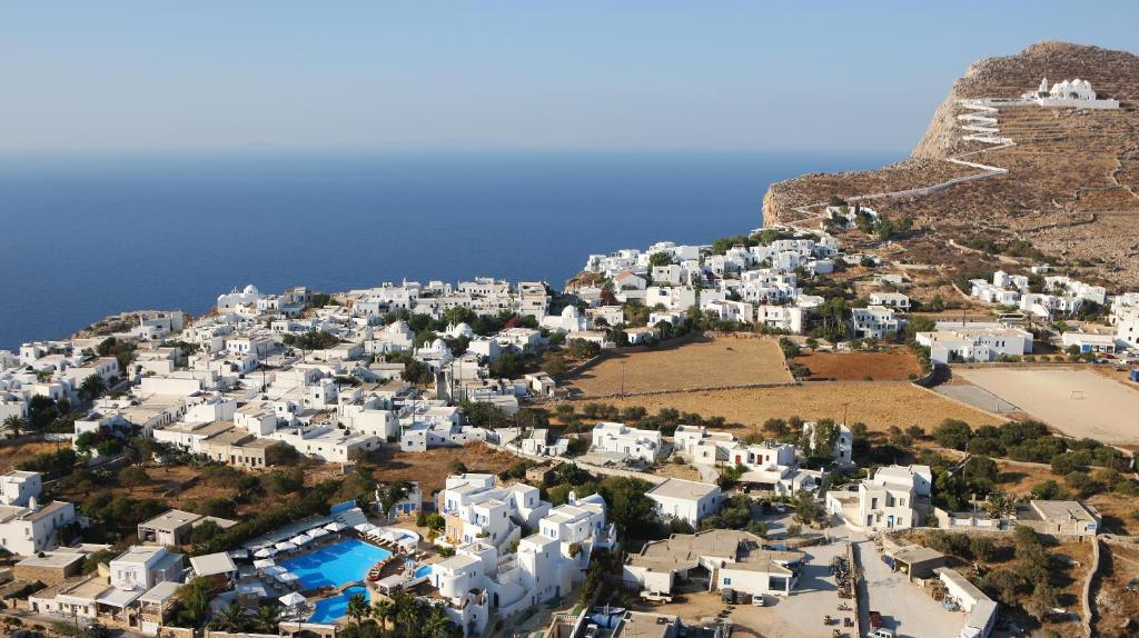an aerial view of a village on a hill at Chora Resort Hotel & Spa in Chora Folegandros