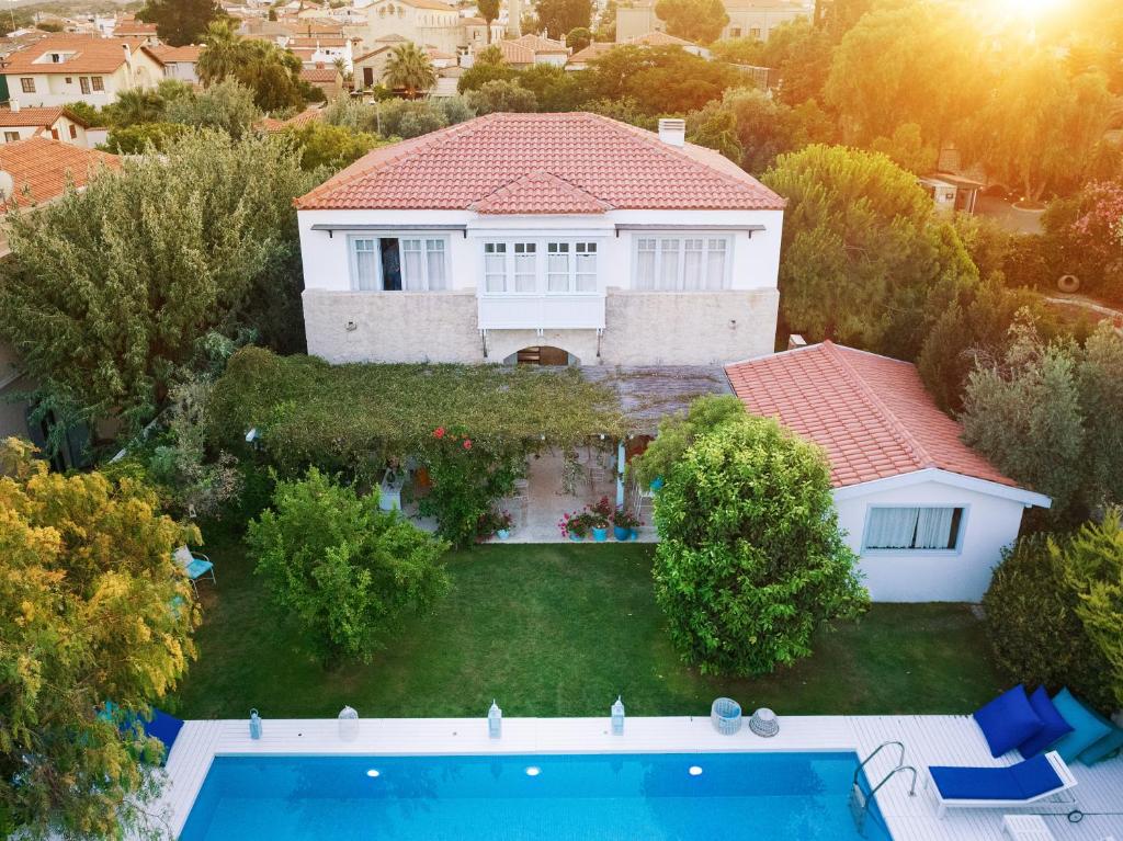 an aerial view of a house with a swimming pool at Alura Hotel in Alacati