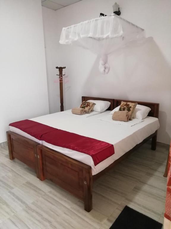 Postel nebo postele na pokoji v ubytování BAS Home Stay