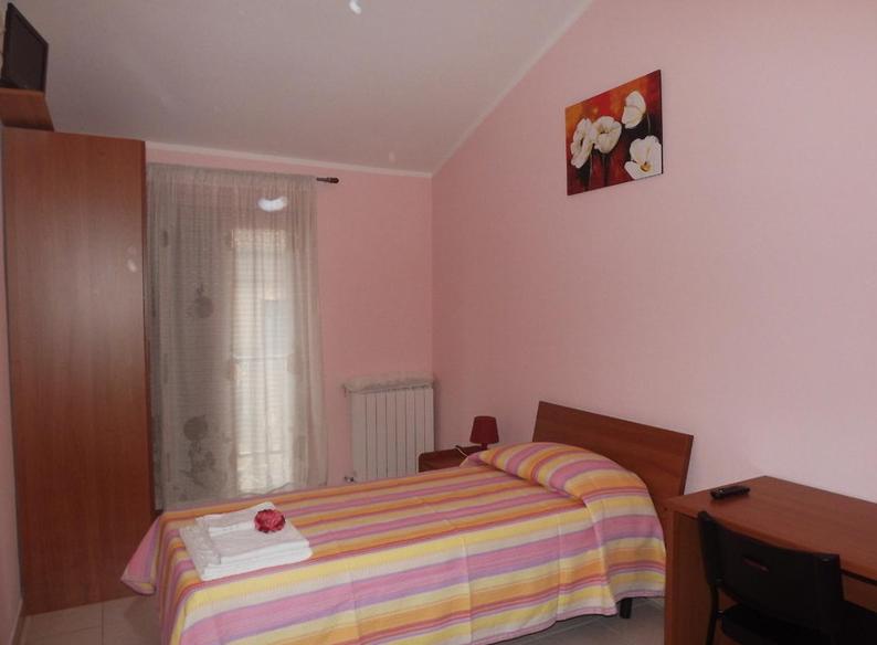 Postel nebo postele na pokoji v ubytování Affittacamere Pone