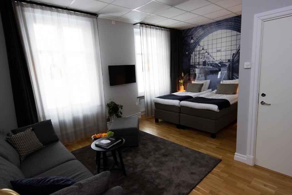 Postel nebo postele na pokoji v ubytování Livin Station Hotel