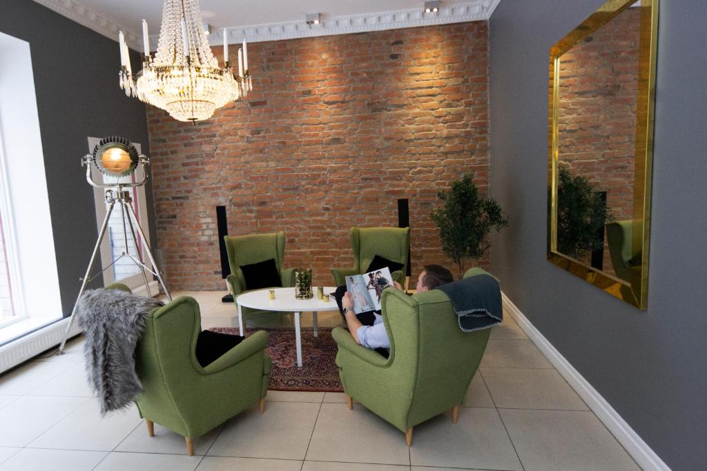 Posezení v ubytování Hotell Hjalmar
