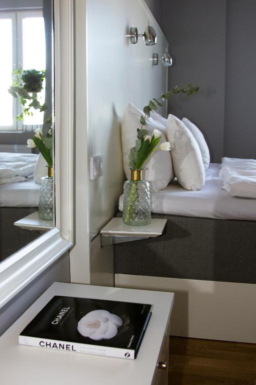Postel nebo postele na pokoji v ubytování Hotell Hjalmar