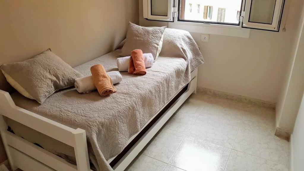 Postel nebo postele na pokoji v ubytování Apartamento a 150 metros de la playa en la Fosca