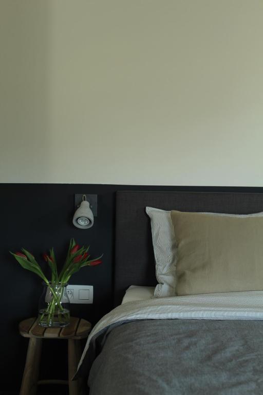 Postel nebo postele na pokoji v ubytování B&B Dageraad