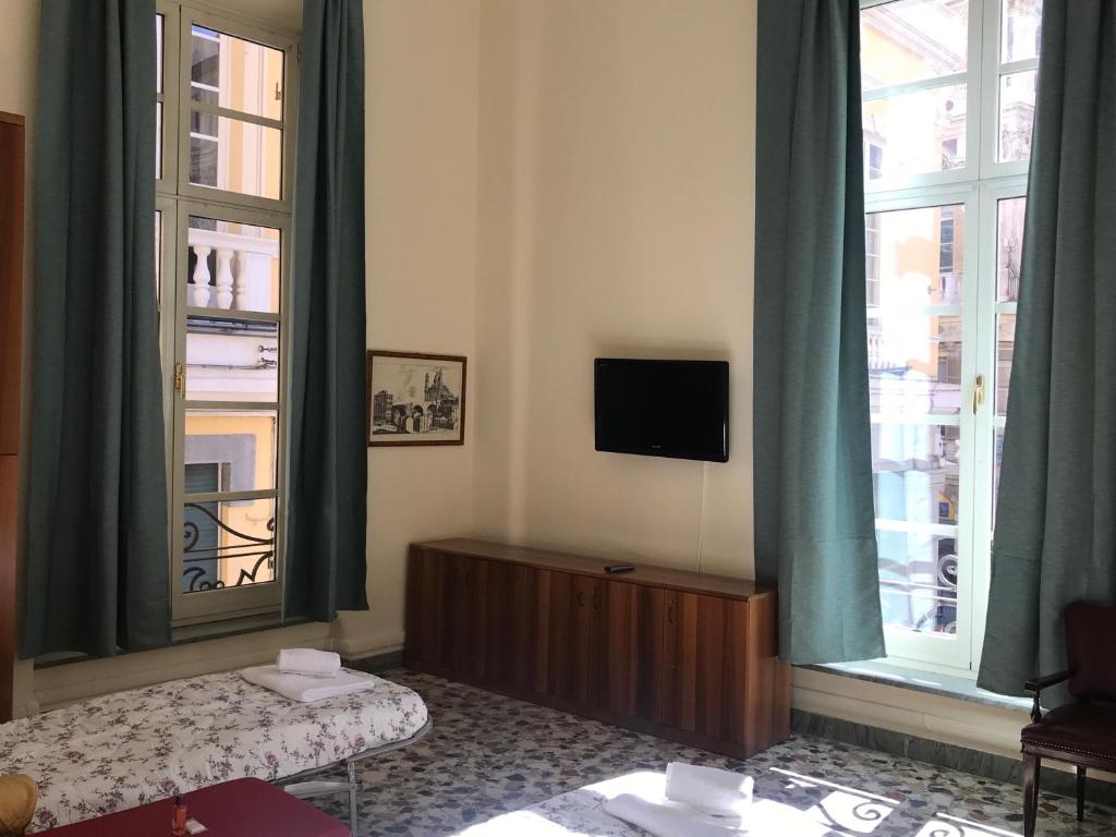 Posteľ alebo postele v izbe v ubytovaní Nunziata Apartment