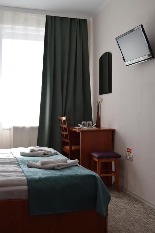 Postel nebo postele na pokoji v ubytování Pension Larisa