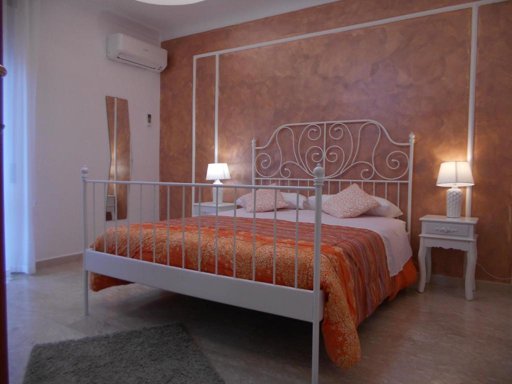Postel nebo postele na pokoji v ubytování Appartamento mare e monti Two