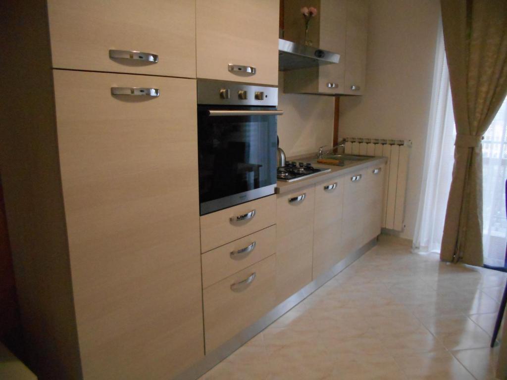 Kuchyň nebo kuchyňský kout v ubytování Appartamento mare e monti Two