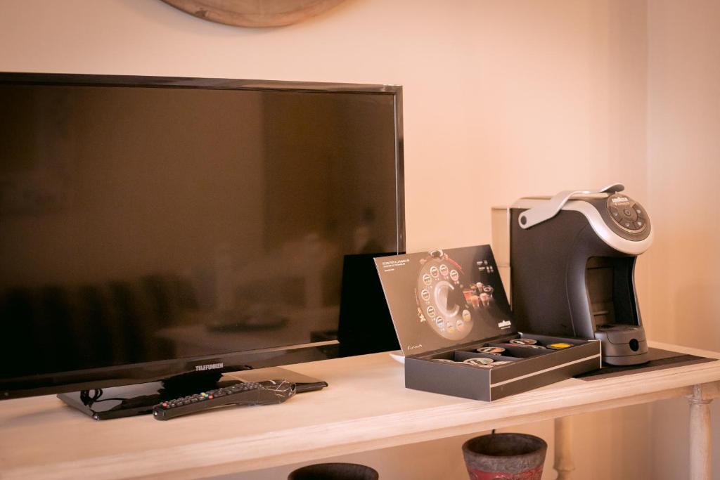 TV a/nebo společenská místnost v ubytování Fontepino