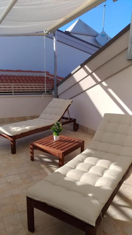 Posedenie v ubytovaní ATTICO MARIS 104 a due passi dalla spiaggia Free Wi Fi