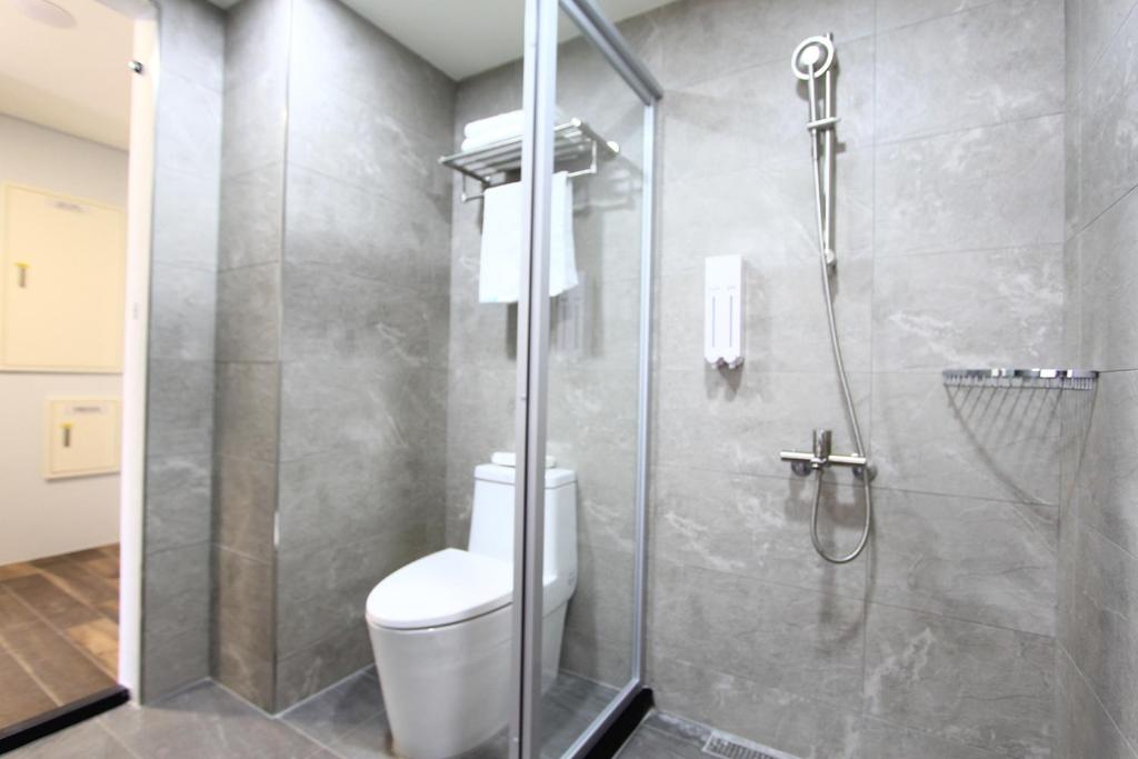 Koupelna v ubytování Apause Hotel