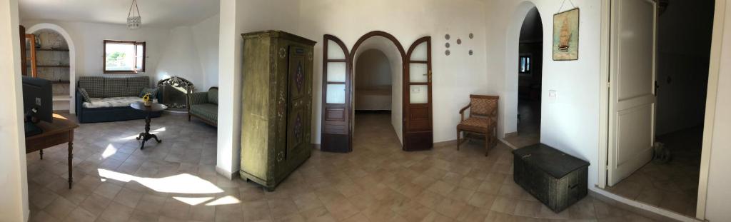 A television and/or entertainment centre at Villa Trullo di Angela