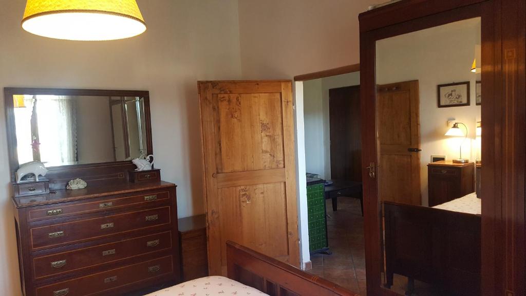 Postel nebo postele na pokoji v ubytování Casa Vacanze Fornace