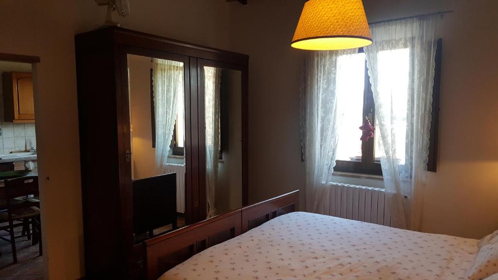 Postel nebo postele na pokoji v ubytování Casa Vacanze Fornace