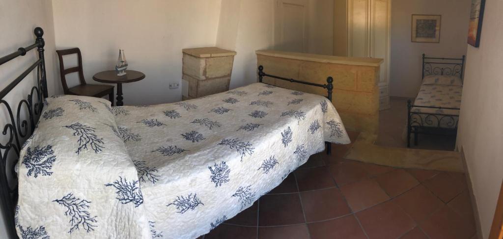 A bed or beds in a room at Villa Trullo di Angela