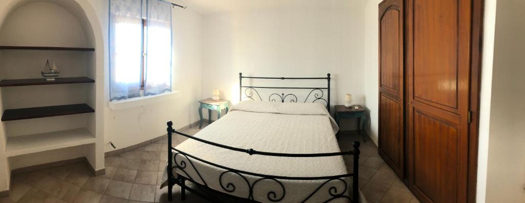 A bed or beds in a room at Villa Trullo di Angela