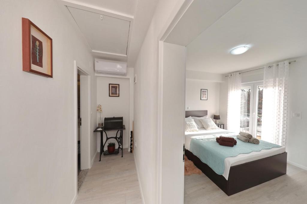 Posteľ alebo postele v izbe v ubytovaní Holiday Home Hrast