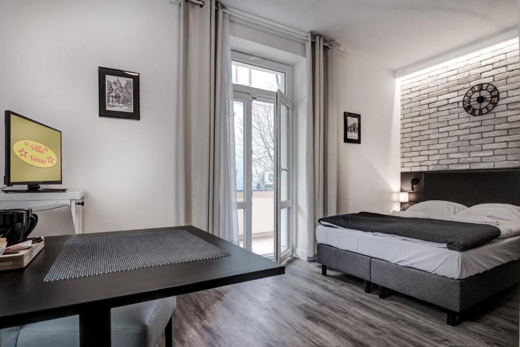 Posteľ alebo postele v izbe v ubytovaní Villa Venus