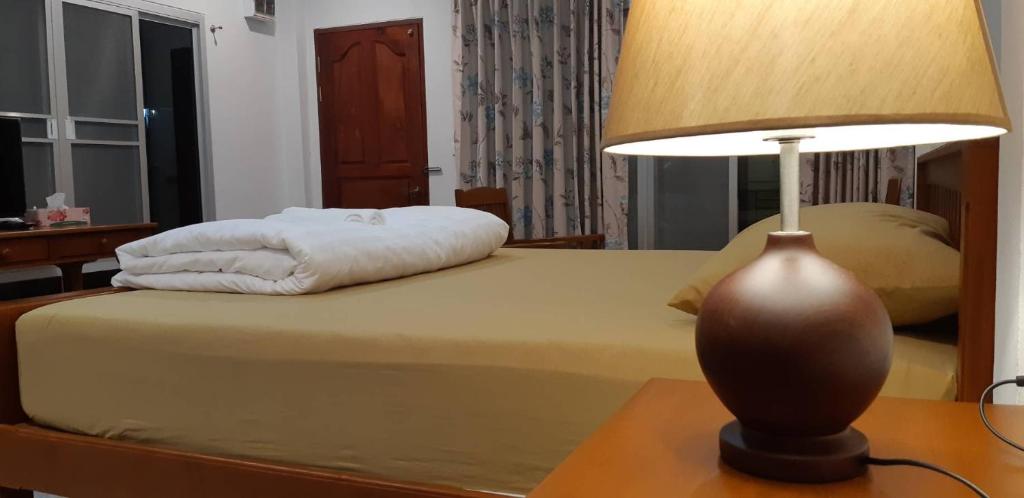 Postel nebo postele na pokoji v ubytování Green Mango Resort