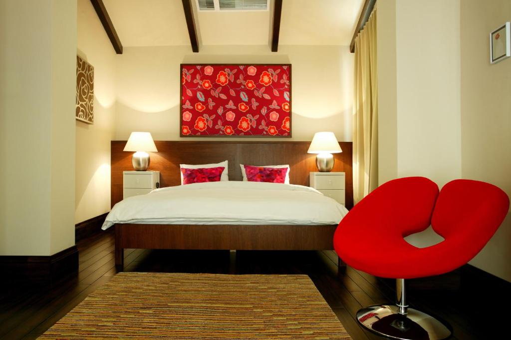 Postel nebo postele na pokoji v ubytování Arena Regia Hotel & Spa - Marina Regia Residence