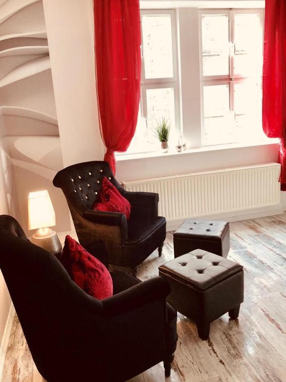 Posezení v ubytování Designpension Traumschloss Hotel Garni