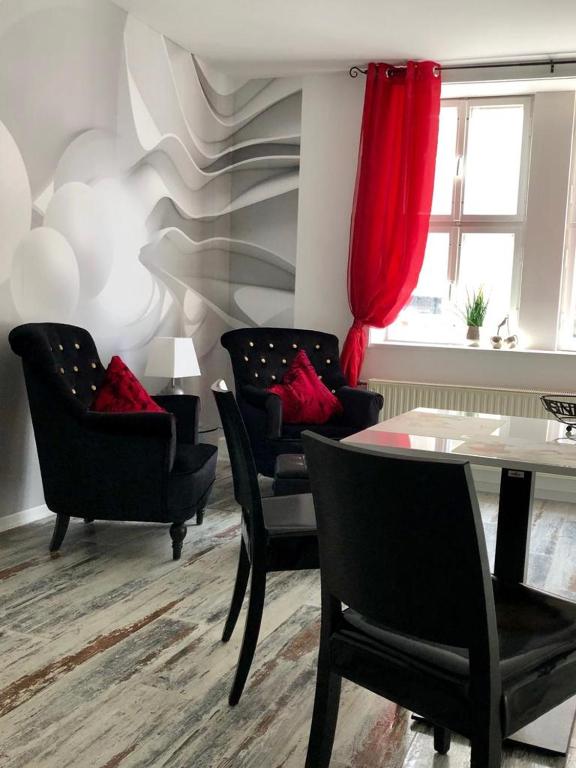 Posezení v ubytování Designpension Traumschloss Hotel Garni