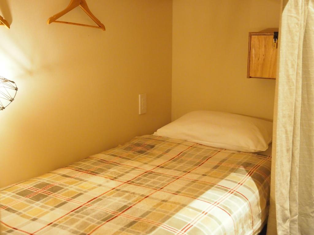 COCORETO The Guesthouse Daikon Island - Letto In Camera A 4 Letti Dormitorio Femminile