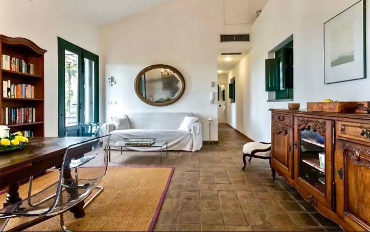 A bed or beds in a room at Borgo degli Aranci