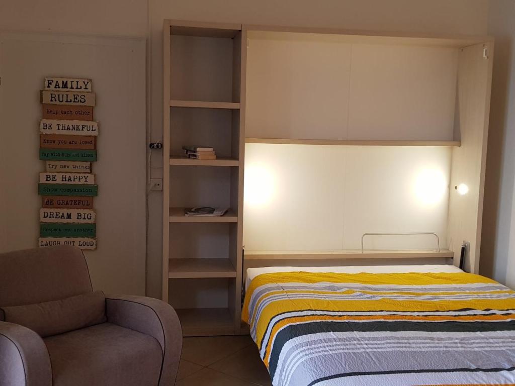 Postel nebo postele na pokoji v ubytování Apartments Posta al Lago