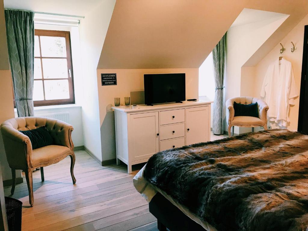 TV a/nebo společenská místnost v ubytování B&B Madoli