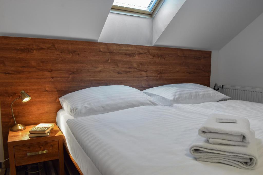 Postel nebo postele na pokoji v ubytování Hotel La Rosa